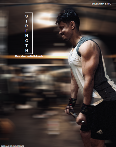 Member pressing dumbbells on an incline bench